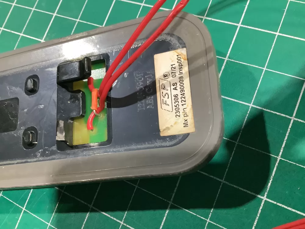 Whirlpool 2305307 Refrigerator Dispenser Actuator Pad AZ144328 | NR2429